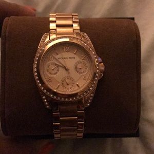 Michael kors brand new women’s golden watch.
